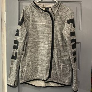 A zip up jacket from the brand PINK.